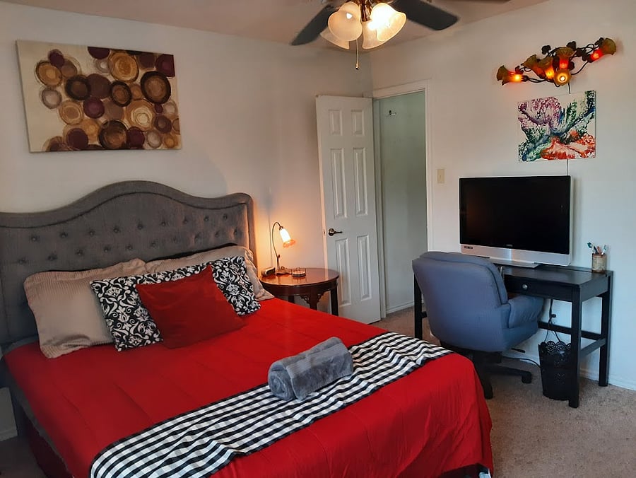 Room 1 w/ walk-in closet & wine fridge
