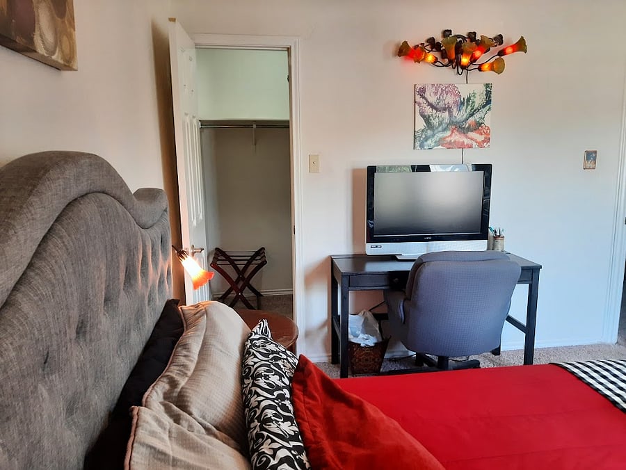 Room 1 w/ walk-in closet & wine fridge