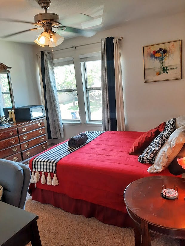 Room 1 w/ walk-in closet & wine fridge