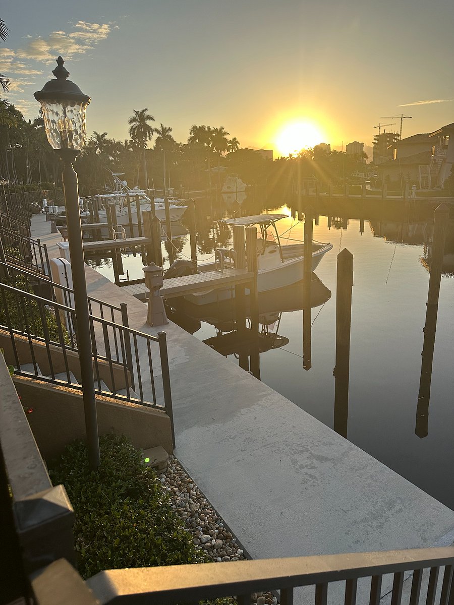 Beautiful South Florida ... my south-facing glass, decks and balconies deliver sunrises to the left (ESE) and sunsets to the right (WSW)