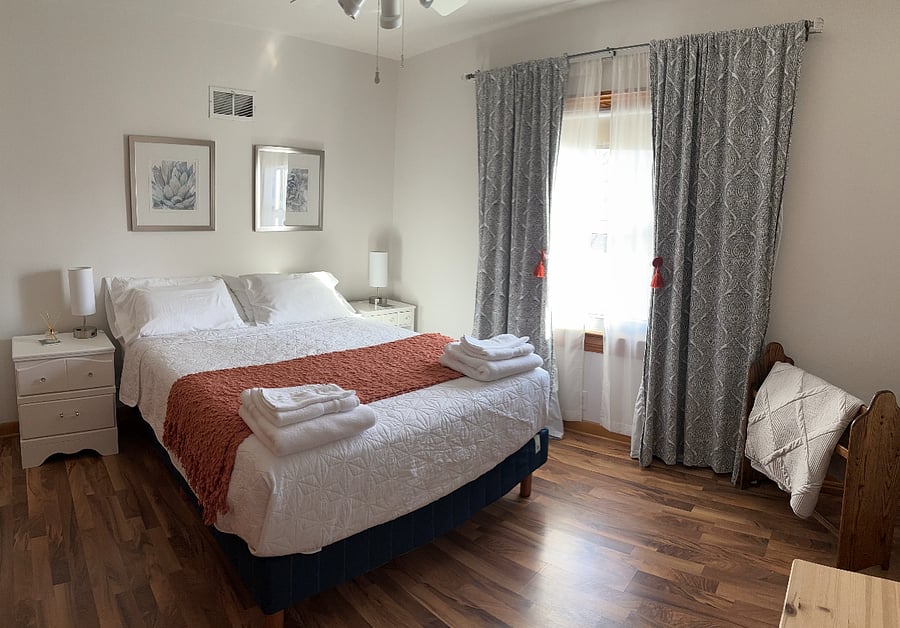 Front bedroom. Queen bed. Verlo mattress, blackout curtains. Closet x 2.