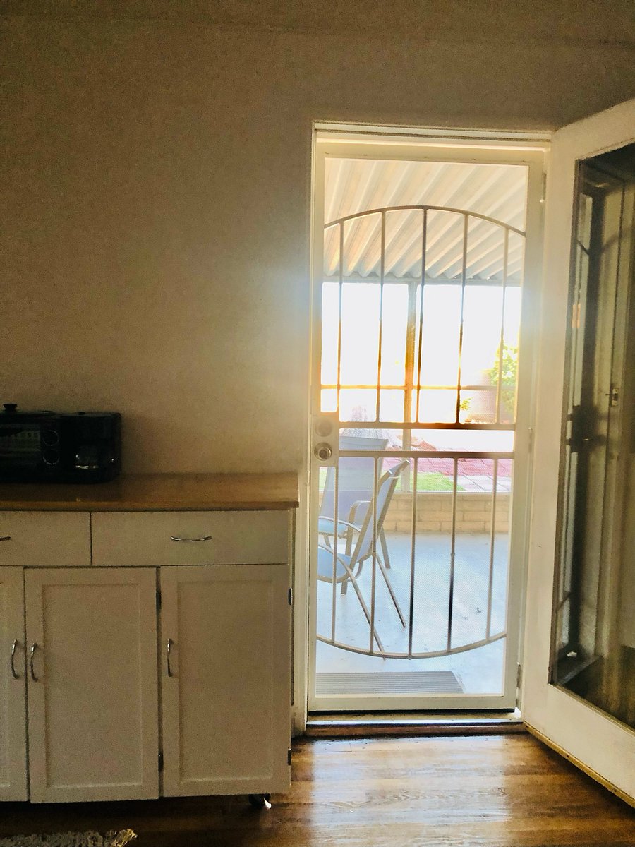 Secure screen door with private access to room from back