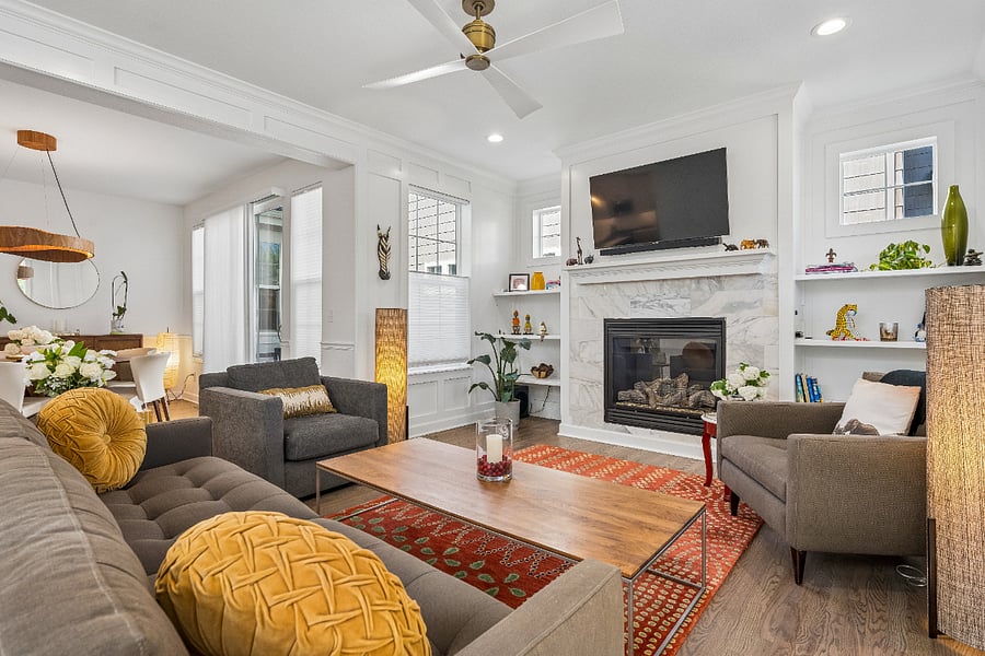 Living room with gas fireplace and smart TV