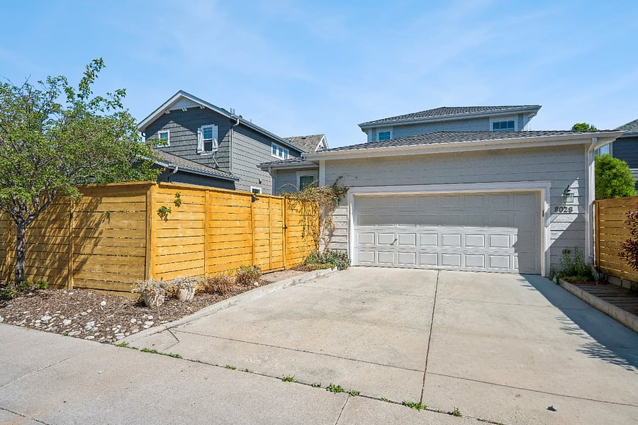 Off-alley driveway and garage