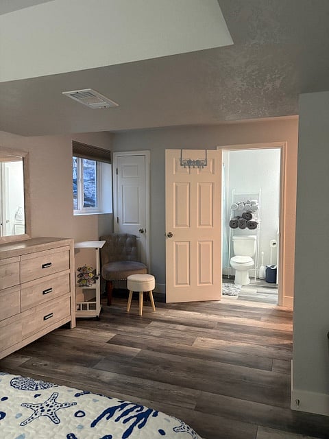 Sitting area with coffee maker and rolling desk 