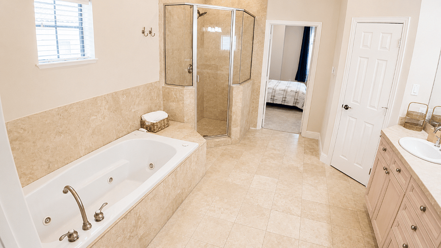 Unwind after a long day. Double vanity, soaking tub & walk-in shower all yours.