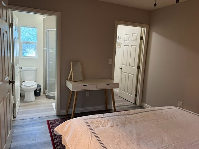 Bedroom 2 with en-suite bath and walk-in closet