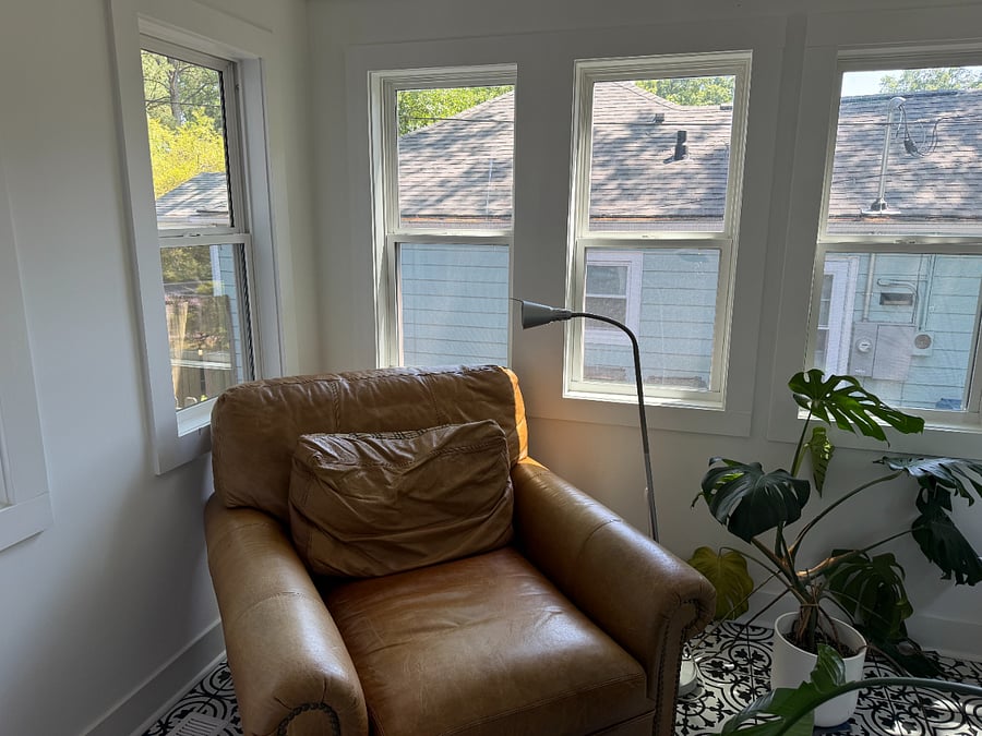 Sunroom with working area and reading nook