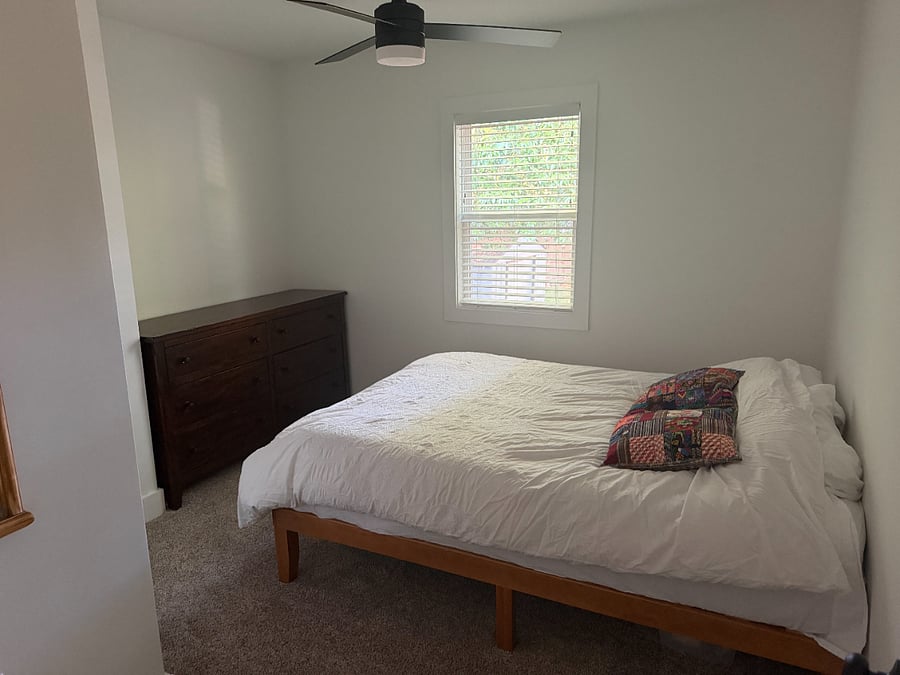 Third bedroom featuring a queen bed