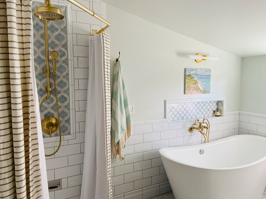 Completely private spa bathroom with rain shower and soaking tub.