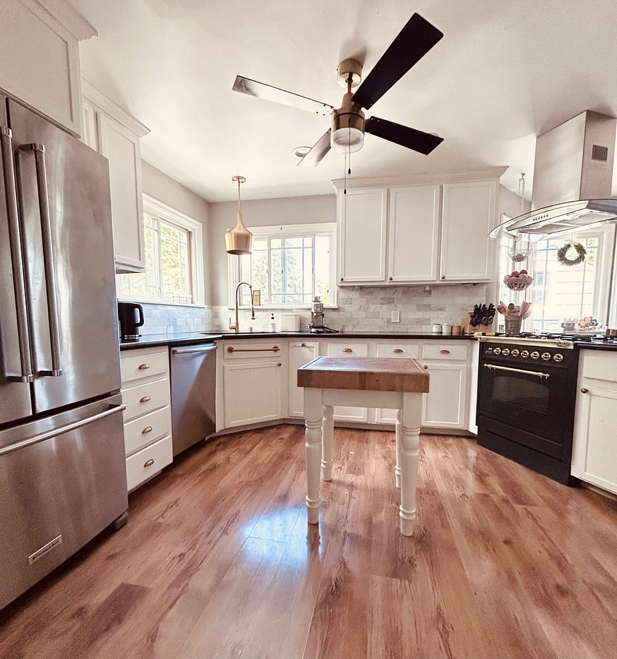 Use of shared updated kitchen on main floor with Italian Ilve gas stove and dedicated pantry space