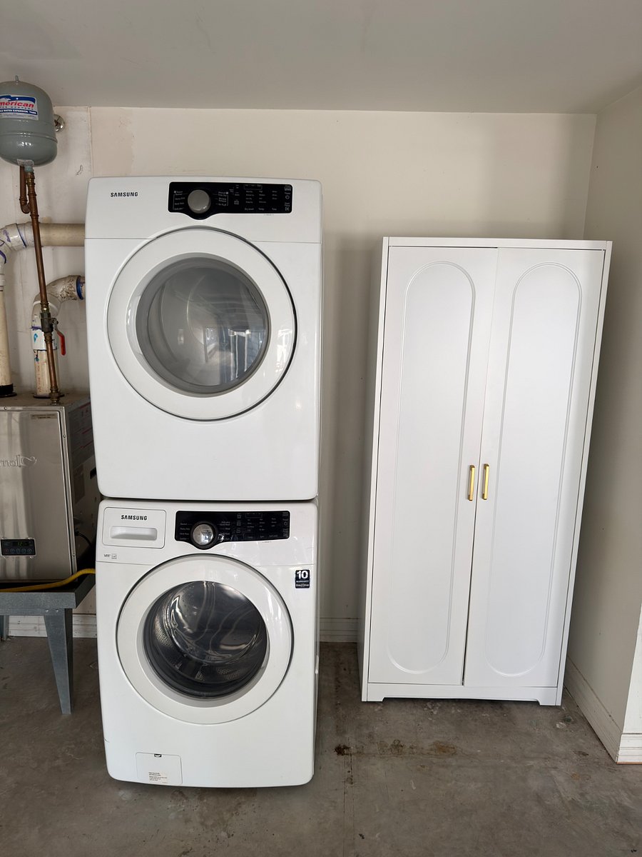 On-site washer/dryer and shelving unit located in the garage. Reserved for guest, not shared.