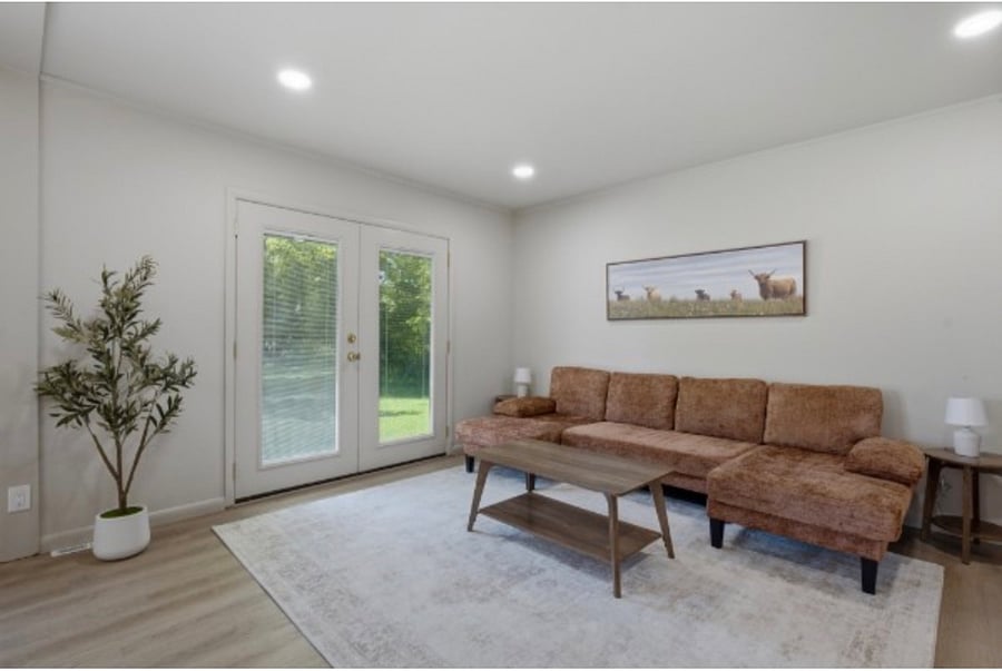 Living Room with lounge sofa, coffee table and end tables.