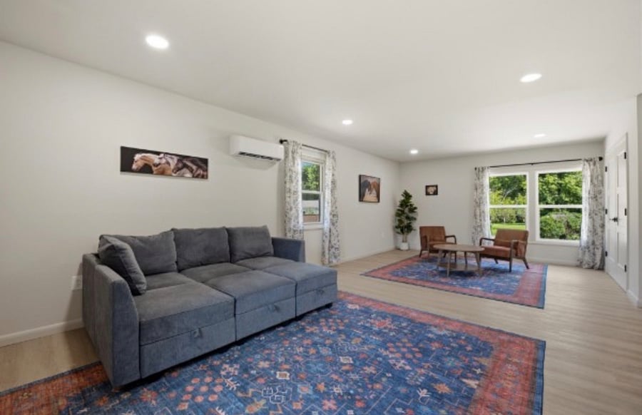 Family Rrom with Large Sectional and 55 TV