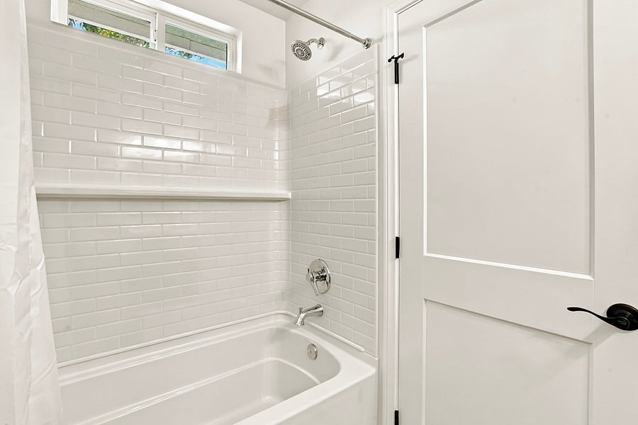 South Bedroom has tub/shower.
It's also accessible from the living room.