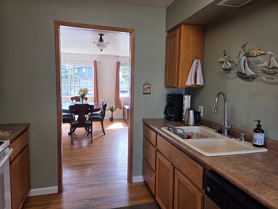 Kitchen: stove, frig, microwave, garbage disposal, dishwasher cook ware, service ware,