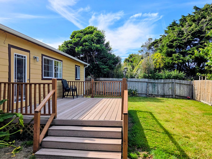 Walk through kitchen to back yard deck- fenced