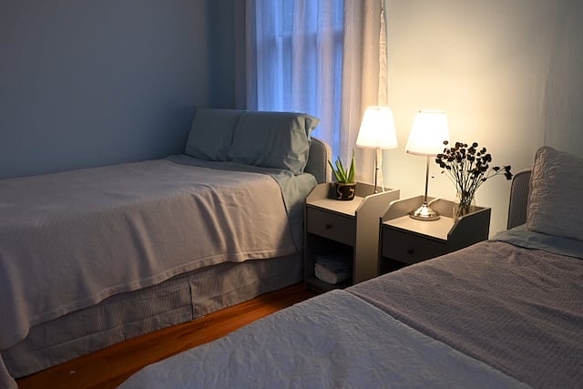 Full Bedroom has two full size beds, two closets, and two dressers. 
