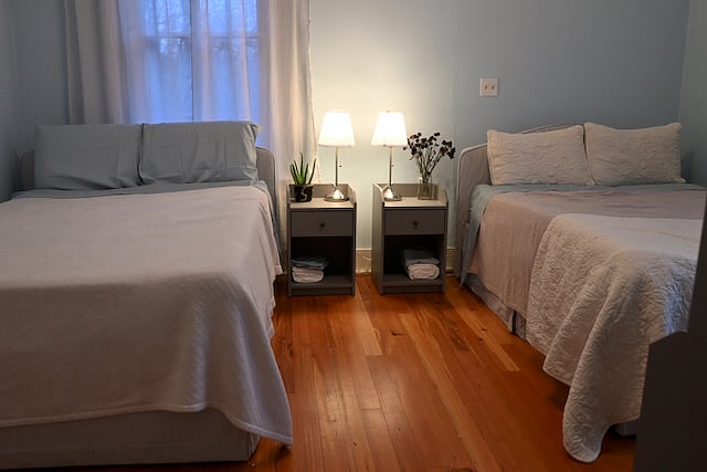 Full Bedroom has two full size beds, two closets, and two dressers. 