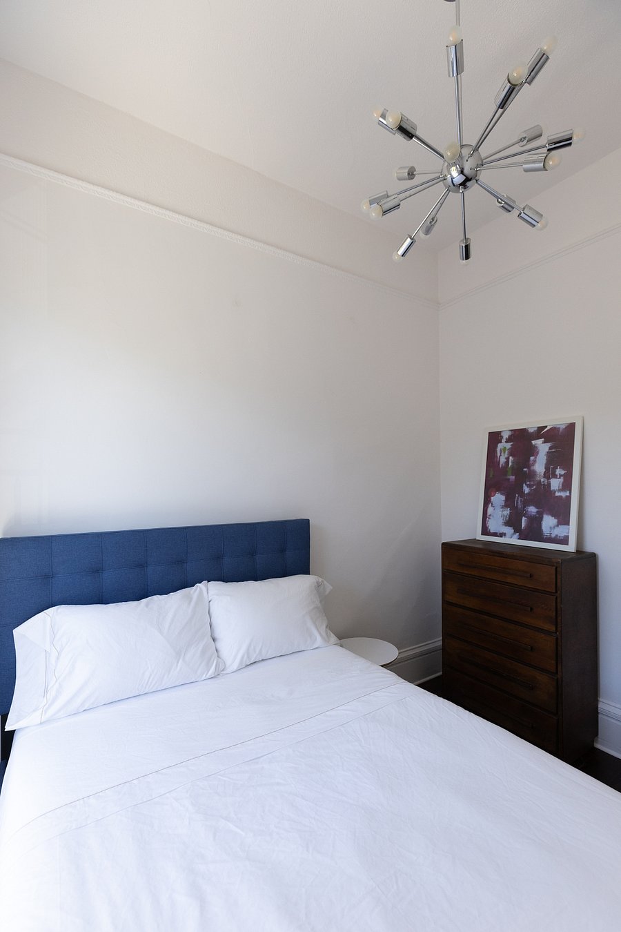 Small bedroom with full size bed
