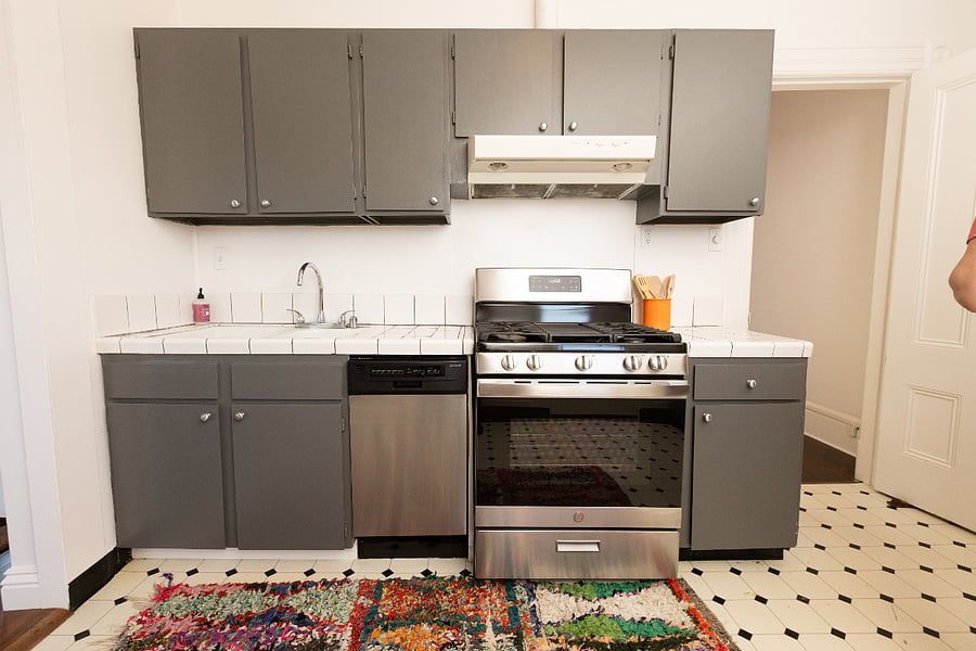 Fully stocked kitchen with stainless steel appliances and 