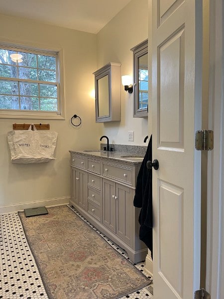 A double vanity and two medicine cabinets for plenty of storage.