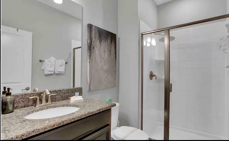 2nd bathroom located downstairs next to 2nd bedroom 