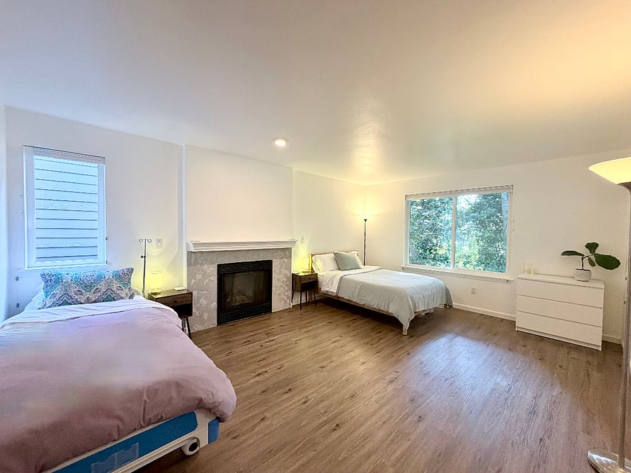 Gas fireplace in between full bed and adjustable twin XL hospital bed
