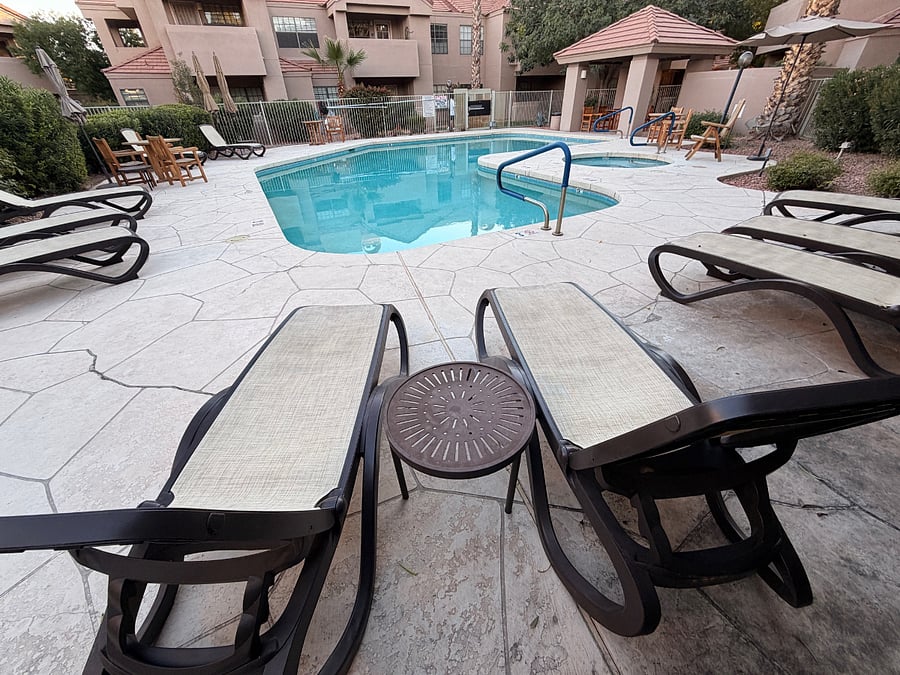 Pool and hot tub steps from patio