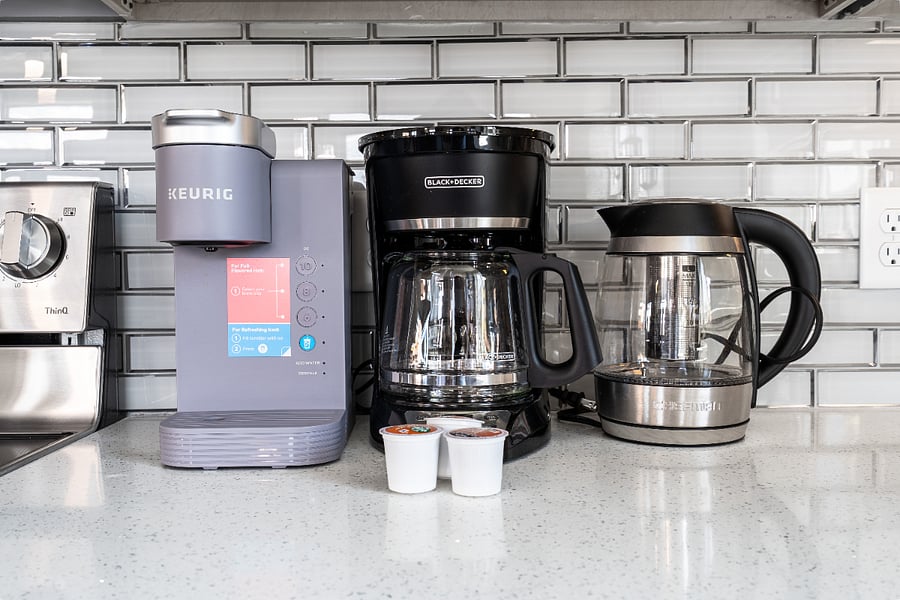 Start your mornings right with both a Keurig and traditional drip coffee maker, plus an electric kettle for tea lovers.