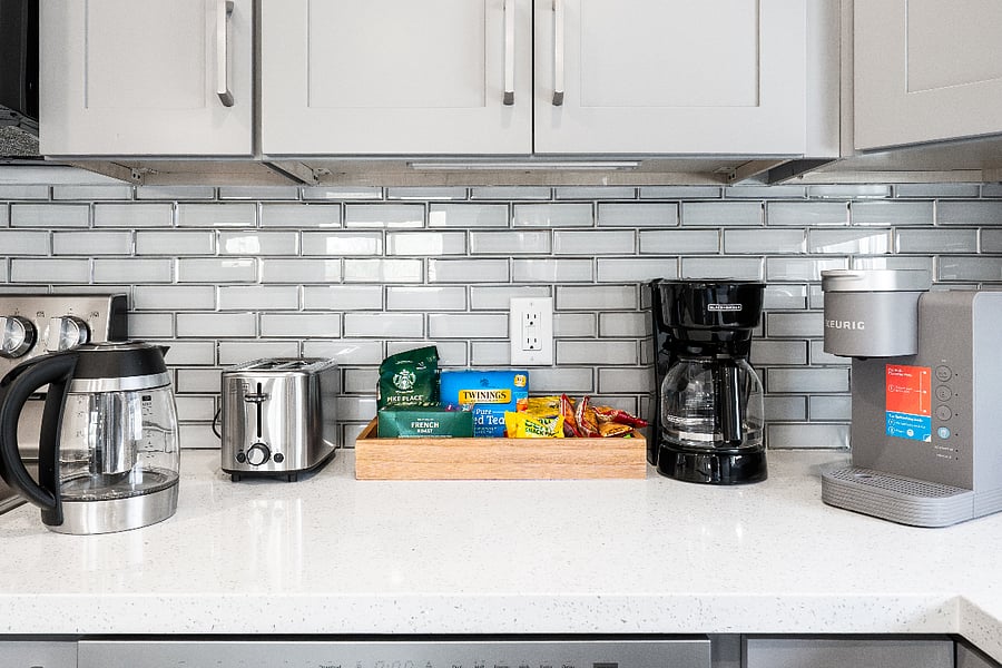 Enjoy a variety of coffee, tea, and light snacks available in the fully stocked beverage station.