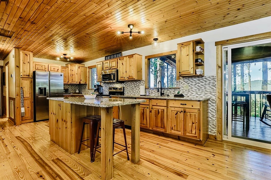 Large kitchen fully stocked with pots, pans, utensils and much more.