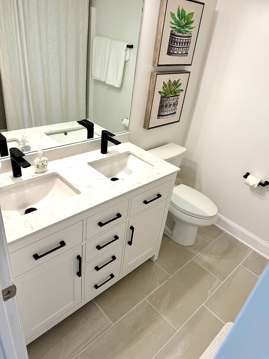 Beautifully renovated upstairs bathroom with double sinks