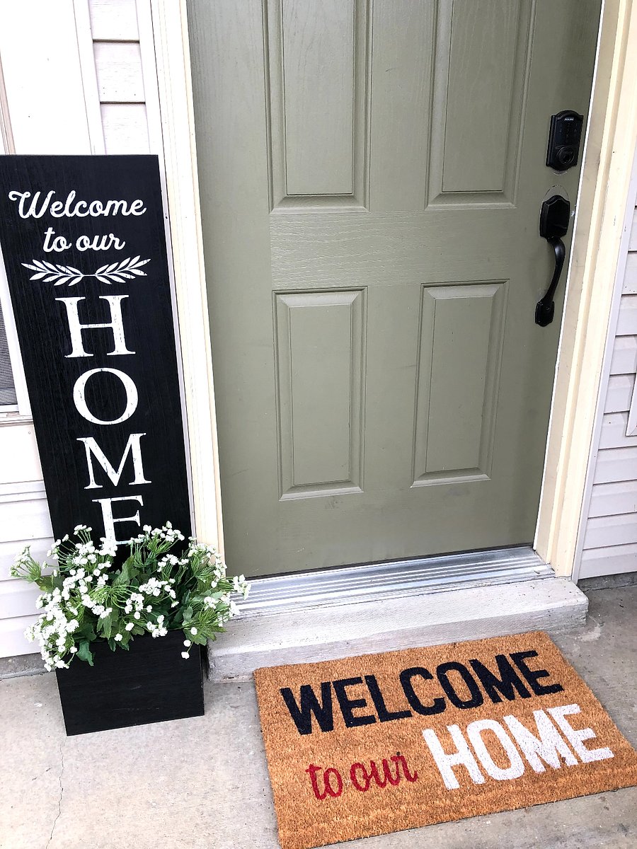 Front door with one step up. Guests check in with self check in keypad.