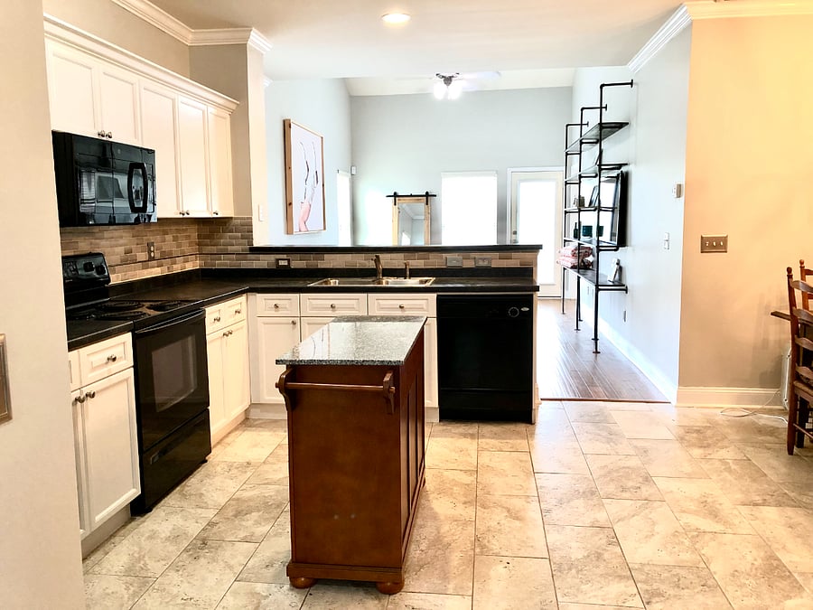 Kitchen with island and eat in area