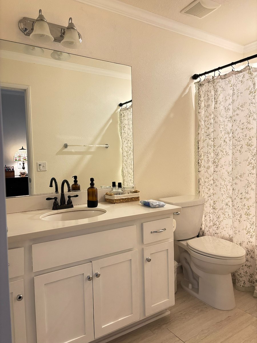 Hall Bathroom primarily reserved for tenant use, shared only occasionally with guests.