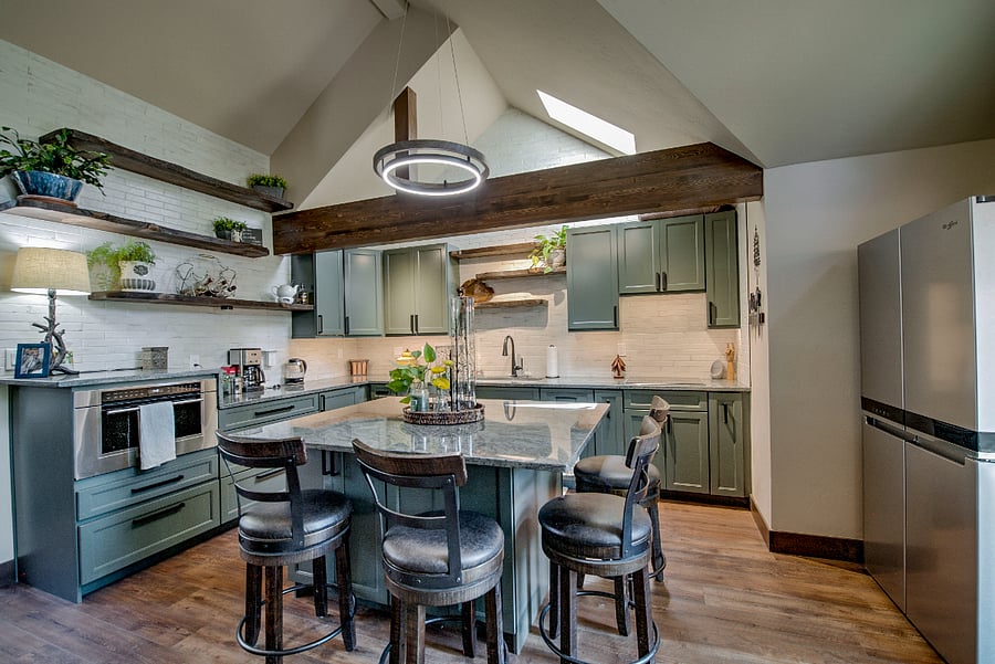 Eat-in kitchen, barstools for 4, frig on the right, speed oven on the left, cooktop and dishwasher also in the kitchen.
