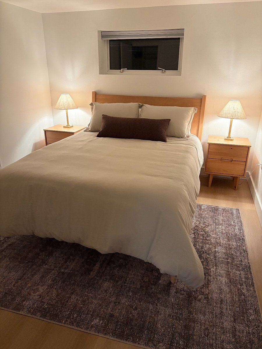Primary bedroom with Queen size bed, brand new Casper mattress, quality linens, and blackout blinds