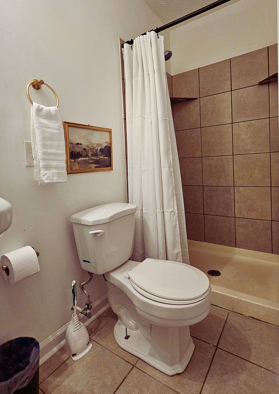 Your private, cozy bathroom with tile shower.