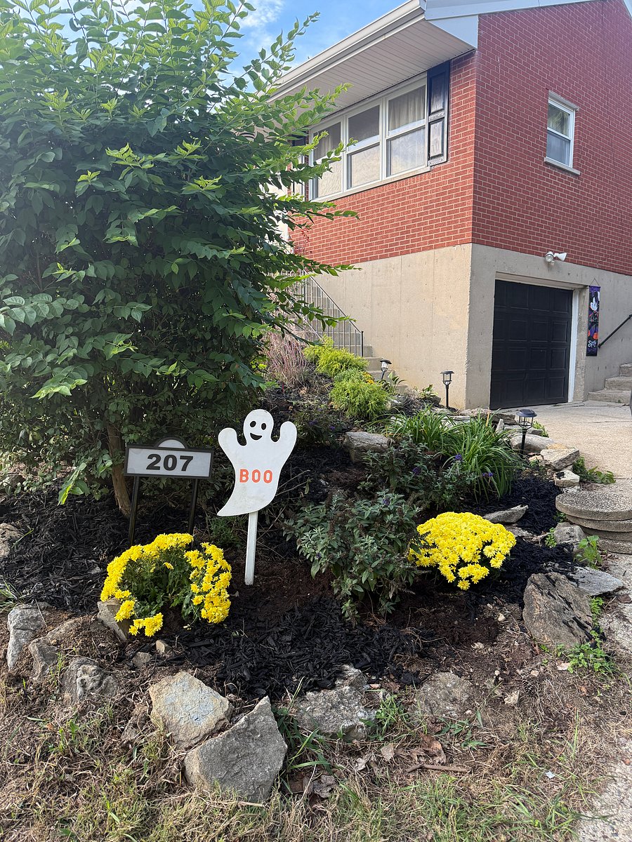 Lighted walkway, New landscaping, maintained by owner