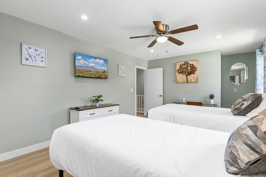 Two Twin beds & workstation in the second bedroom
