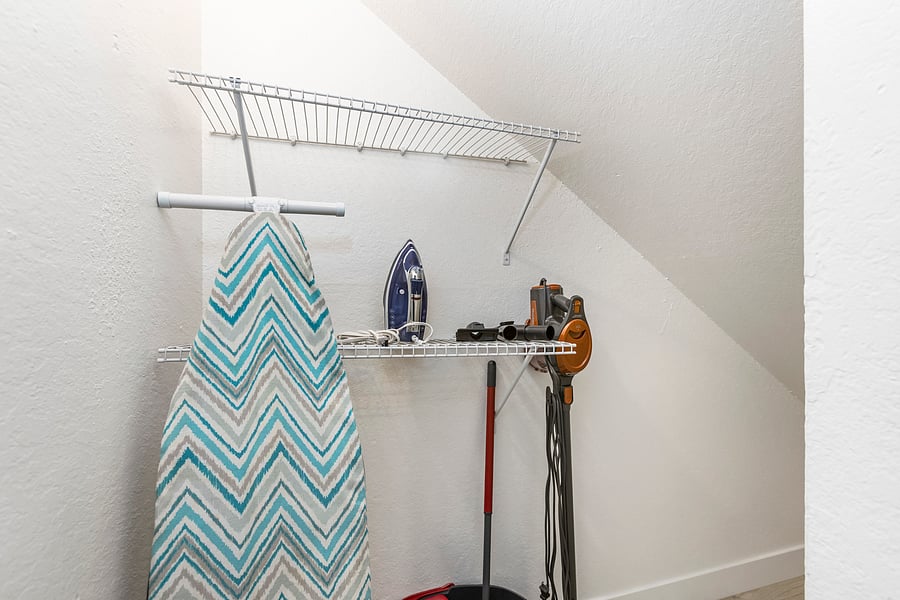 The house includes a Pack 'n Play, a vacuum, and an iron with an ironing board for your convenience.