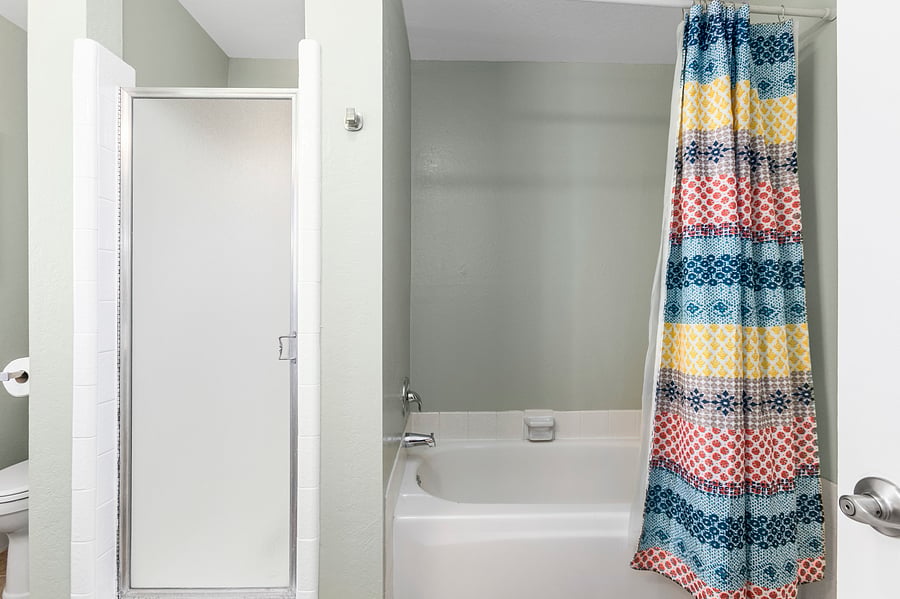 Full Bathroom (Upstairs) - Includes a bathtub, shower, toilet, and vanity.
