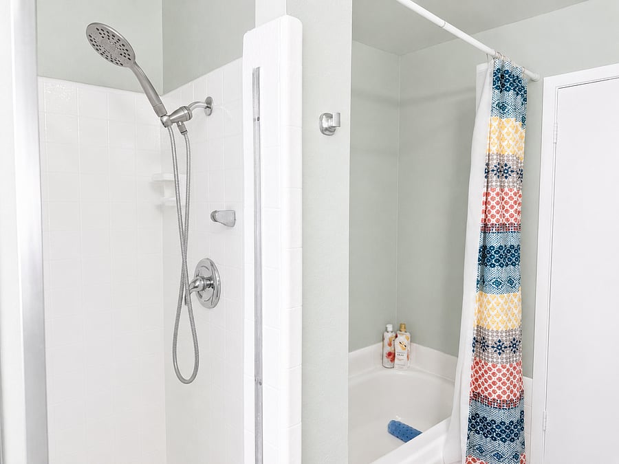 Full Bathroom (Upstairs) - Includes a bathtub, shower, toilet, and vanity.