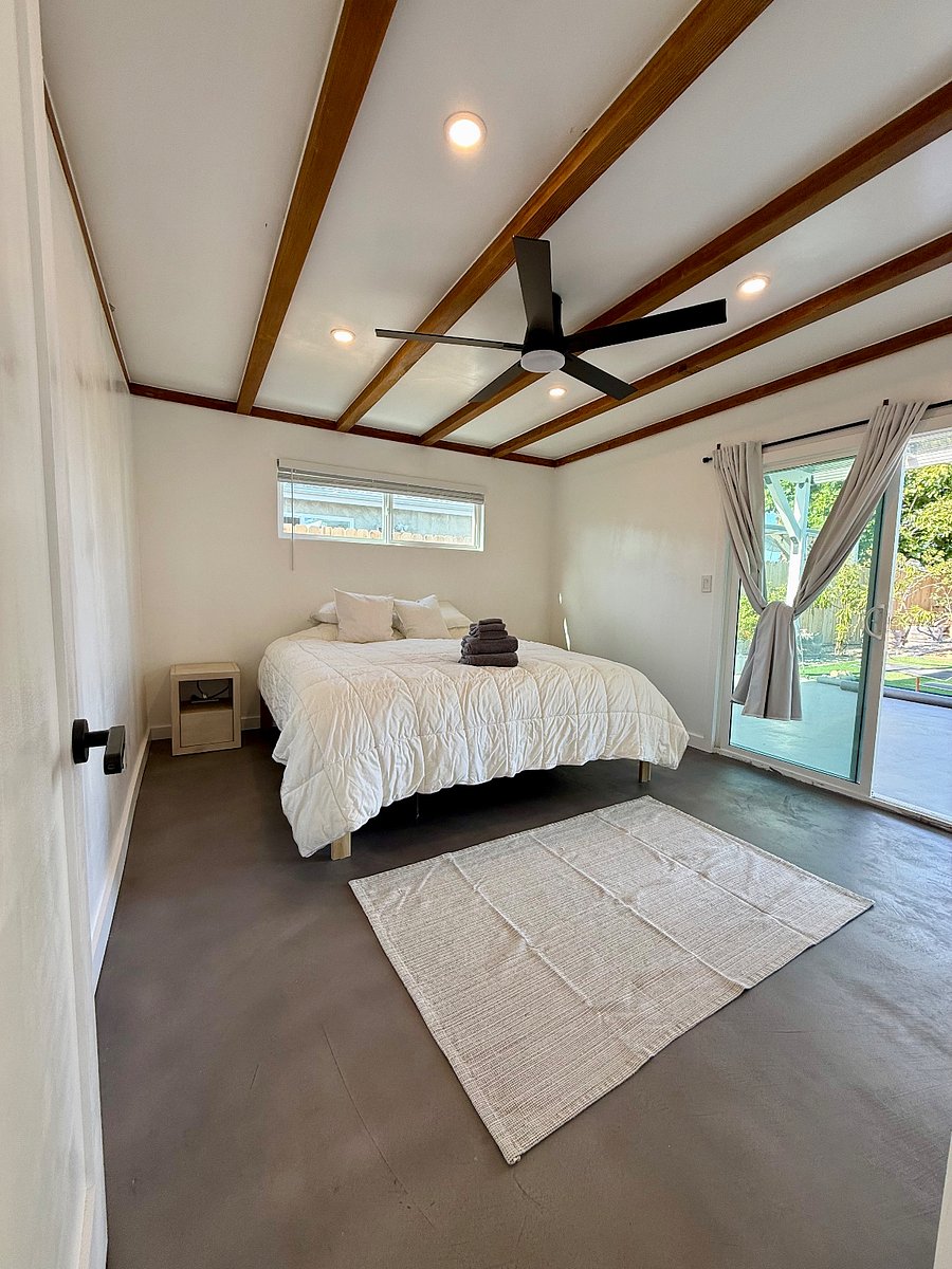Largest room #4. Side window and large Slider door with screen.