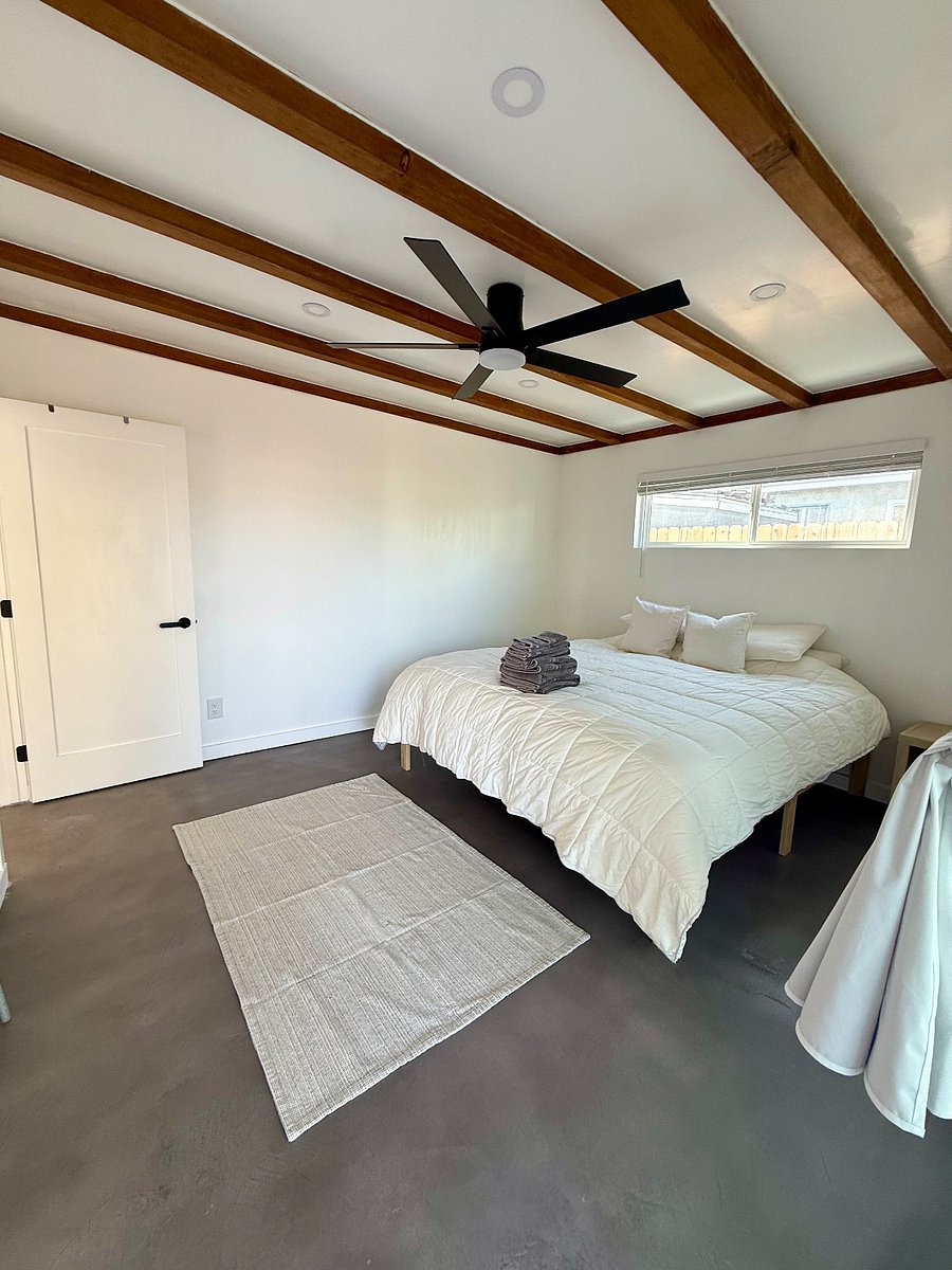 Largest room #4. Side window and large Slider door with screen.