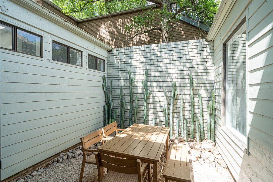 Enjoy the peaceful, private atrium. A unique outdoor retreat perfect for morning coffee or unwinding in the evening.