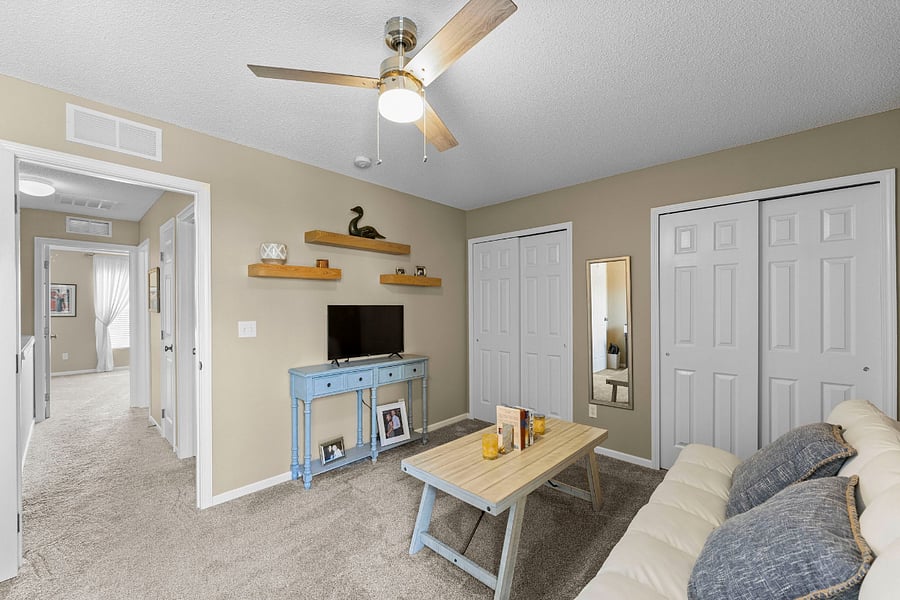Smart tv and double closets with linens