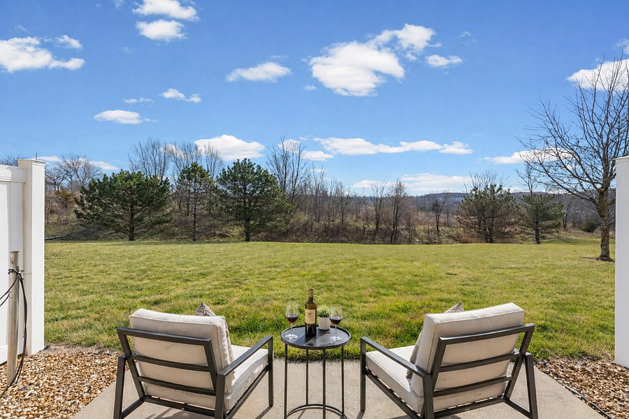 Patio that looks over tranquil green space
