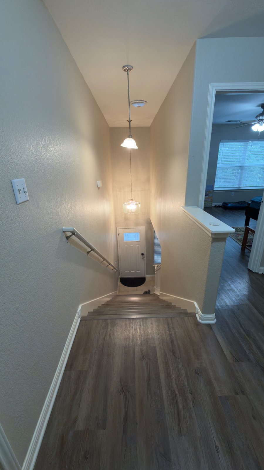 going downstairs to the front door.